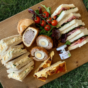 A selection of fresh Deli items including a scotch egg, pork pie, sandwich selection, quiche, chutney, tomatoes & salad. Order in store for collection and enjoy anywhere!