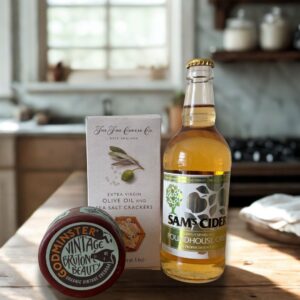 Fun & cheap gift idea with a bottle of sams crisp devon cider, fine cheese co crackers and a godminster vintage chaddar truckle. who wouldn't like this one!
