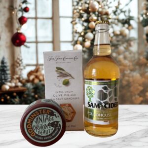 Fun & cheap gift idea with a bottle of sams crisp devon cider, fine cheese co crackers and a godminster vintage chaddar truckle. who wouldn't like this one!