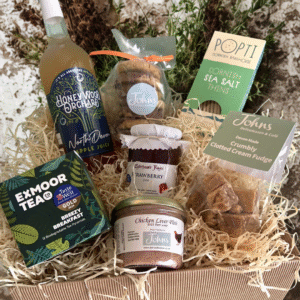 Johns Westcountry Hamper - Medium. A handpicked selection of sweet & savoury westcountry produce packaged into our Johns branded cardboard hamper box that can be re-used or recycled making this a sustainable gift