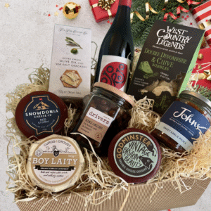 A fine selection of cheeses plus crackers, chutney, extras and wine! The gift of all gives for your foodie friend, work colleague or family member.