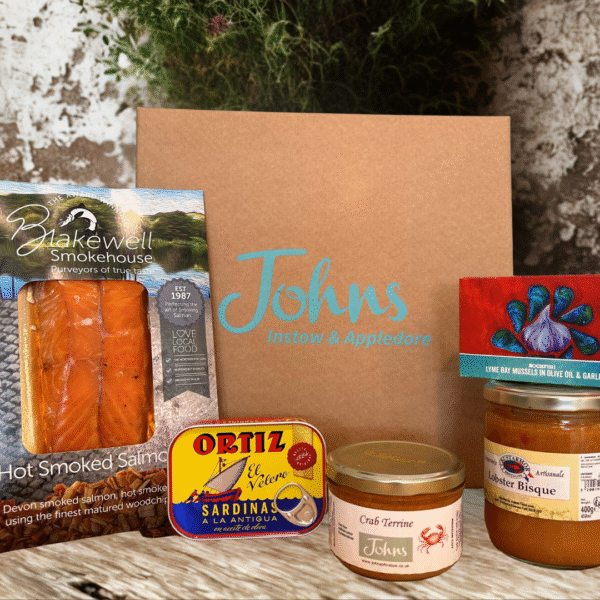 Johns Fish Lovers Hamper is a selection of smoked salmon, tinned sardines, crab terrine, lobster bisque and tinned mussels. A great fish gift