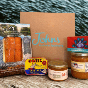 Johns Fish Lovers Hamper is a selection of smoked salmon, tinned sardines, crab terrine, lobster bisque and tinned mussels. A great fish gift