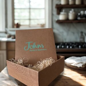 Johns Branded cardboard box. with wood wool. Ideal for filling with you favourite products for a easy gift. Come in store and we can help you choose- for the perfect gift.