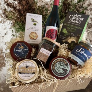Johns Cheese Lovers Hamper with a selection of fresh local cheese, truckles, wine, crackers and pickles. A perfect treat for all cheese lovers