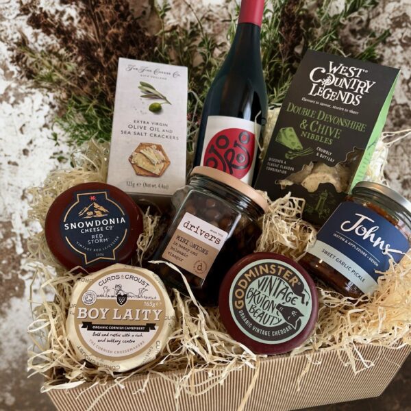 Johns Cheese Lovers Hamper with a selection of fresh local cheese, truckles, wine, crackers and pickles. A perfect treat for all cheese lovers