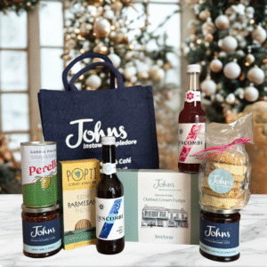 A selection of sweet & savoury hand picked products for the perfect gift. Packed into our small Navy Jute Bag