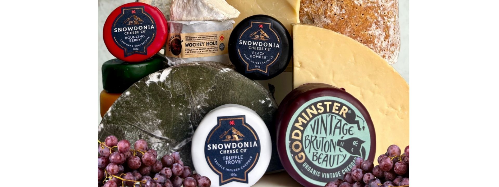 Selection of local produced cheese, godminster truckles, snowdonia, cornish yarg, cheddar & stilton