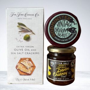 Fine Cheese Co Olive Oil Crackers, Godminster Cheddar Truckle & Otter Vale Chutney Gift Bag. Three perfect pairing to be enjoyed