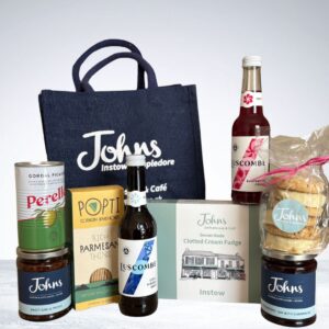 A carefully curated selection of sweet and savoury treats, beautifully presented in our small navy jute bag – the perfect gift.