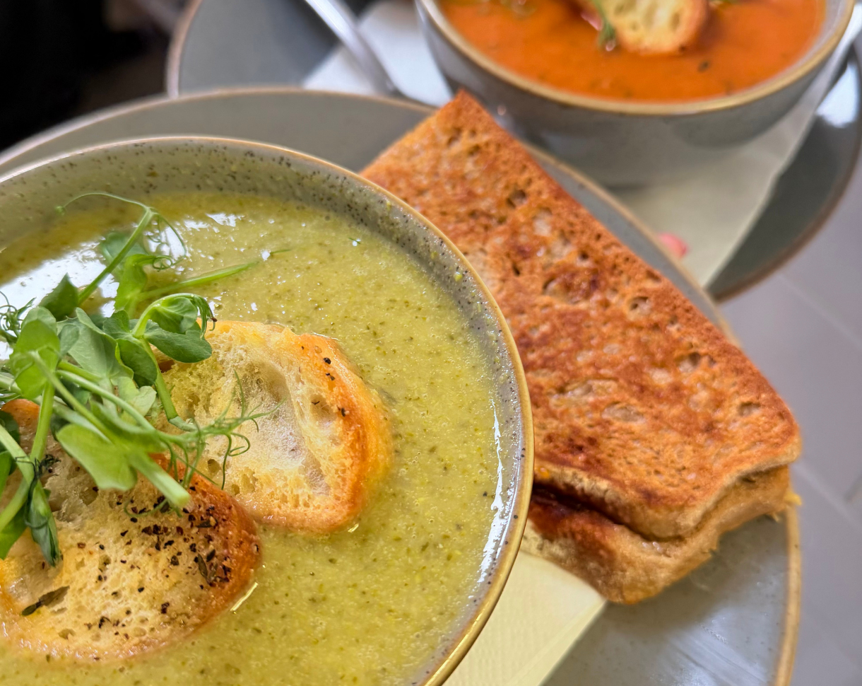 Vibrant Green Broccoli soup with half a toastie